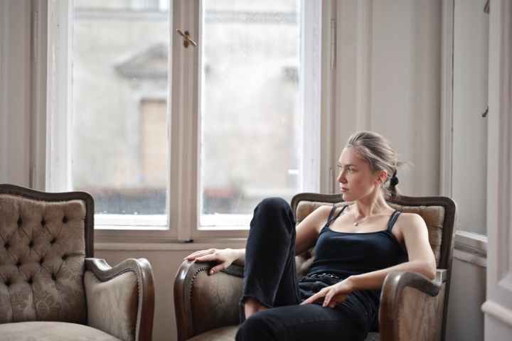 woman sitting on chair